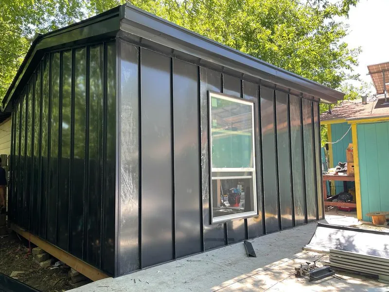 Black standing seam metal wall panels for Roof Inspection in Elko New Market