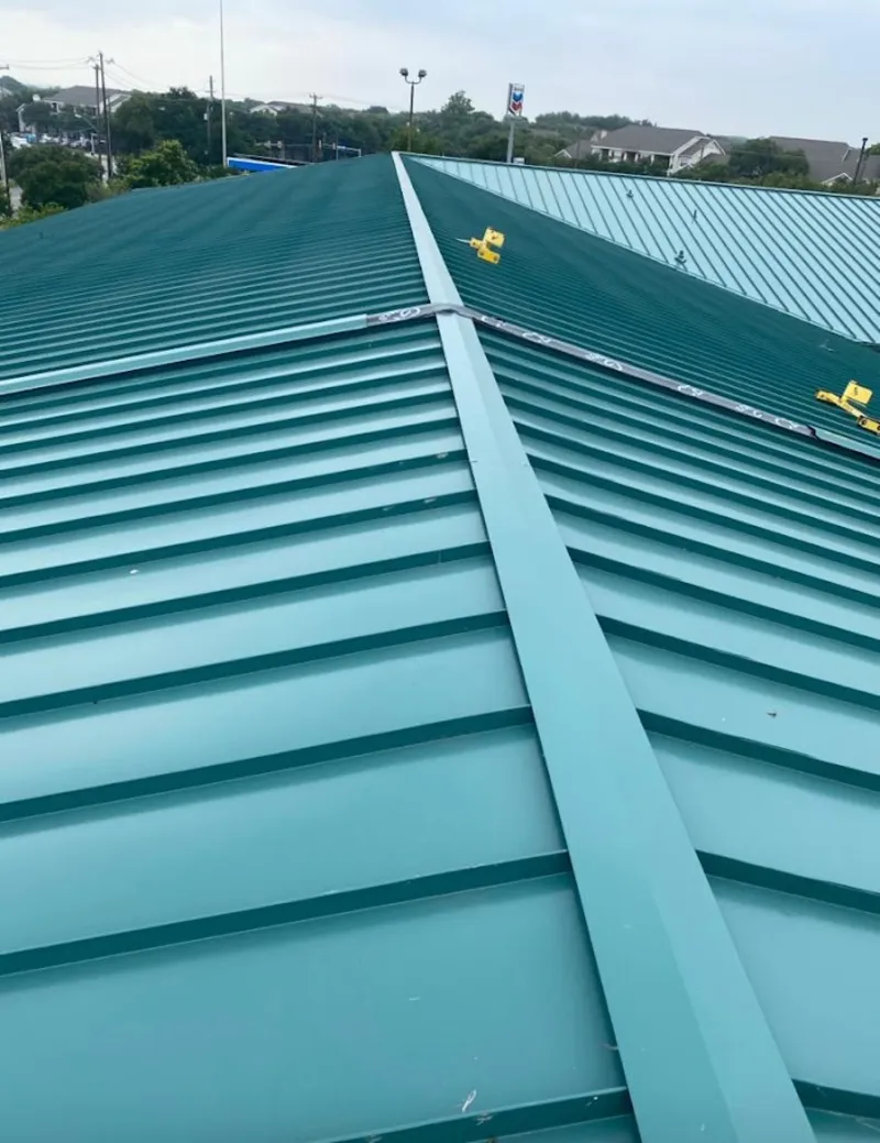 Green commercial metal roof ridge and valley for Metal Roof Repair in Elko New Market
